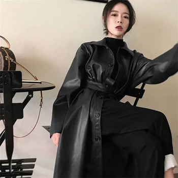 Ilgai viršutiniai drabužiai juodos odos tranšėjos paltai moterims ilgomis rankovėmis diržo atvartas Moterų mados 2022 Prabanga pavasarį Britų Stiliaus